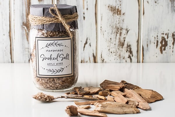 Jar of smoked salt with loose wood chips