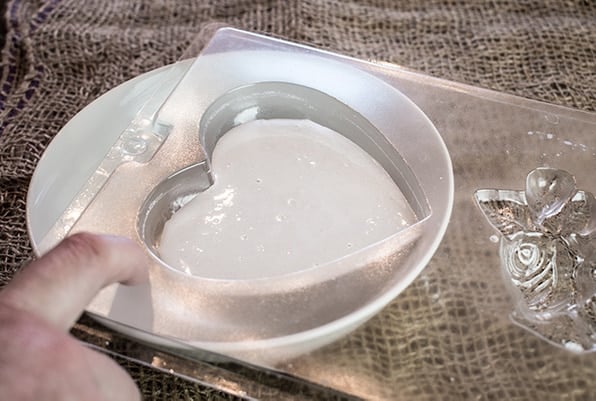 Tapping Bubbles out of Poured Plaster of Paris