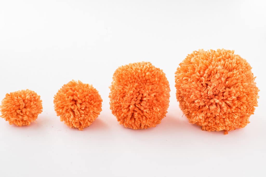 How to Make Yarn Pom Poms and Pick the Right Size Yarn