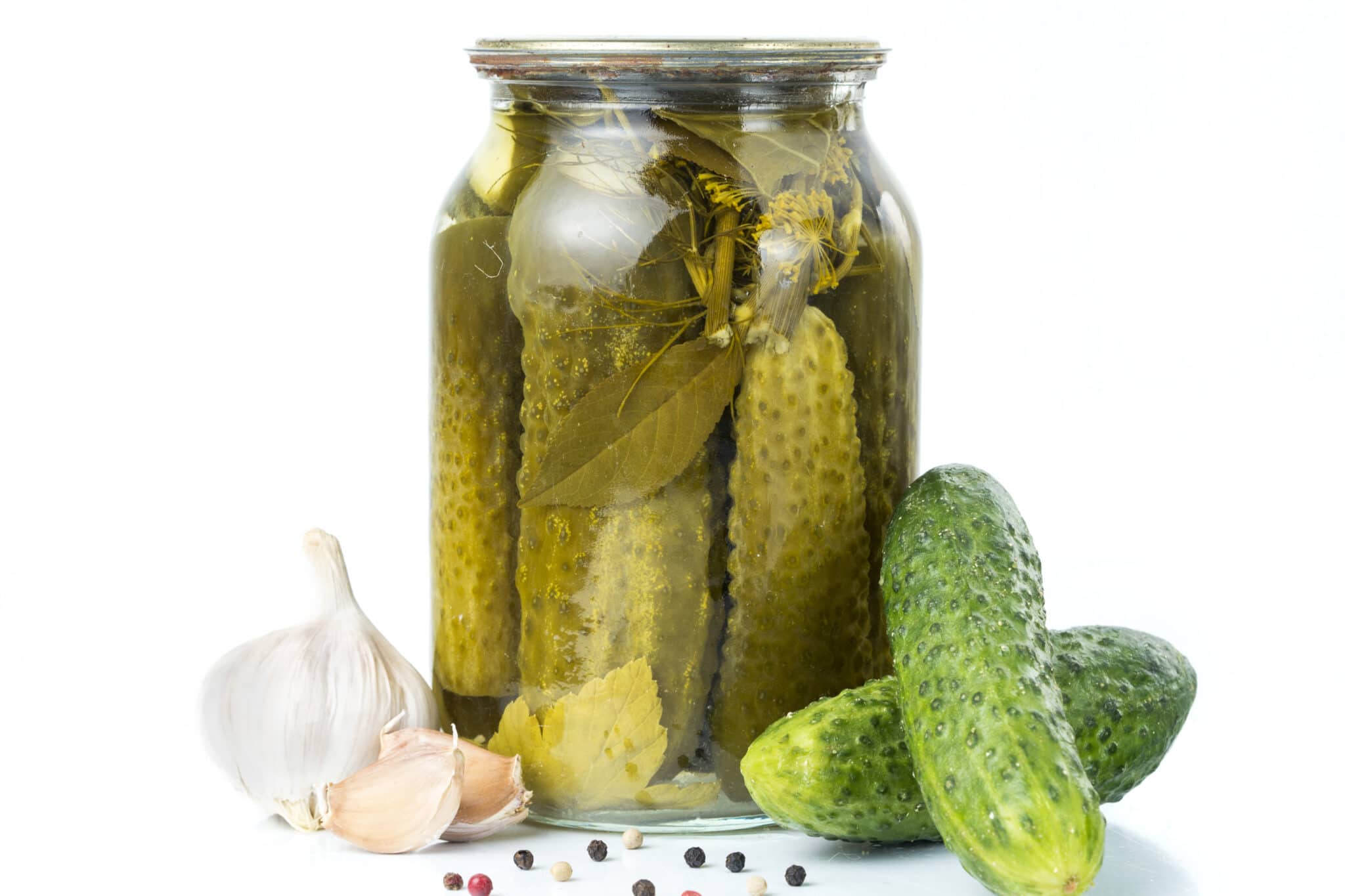 Fermented cucumber pickles in a jar.