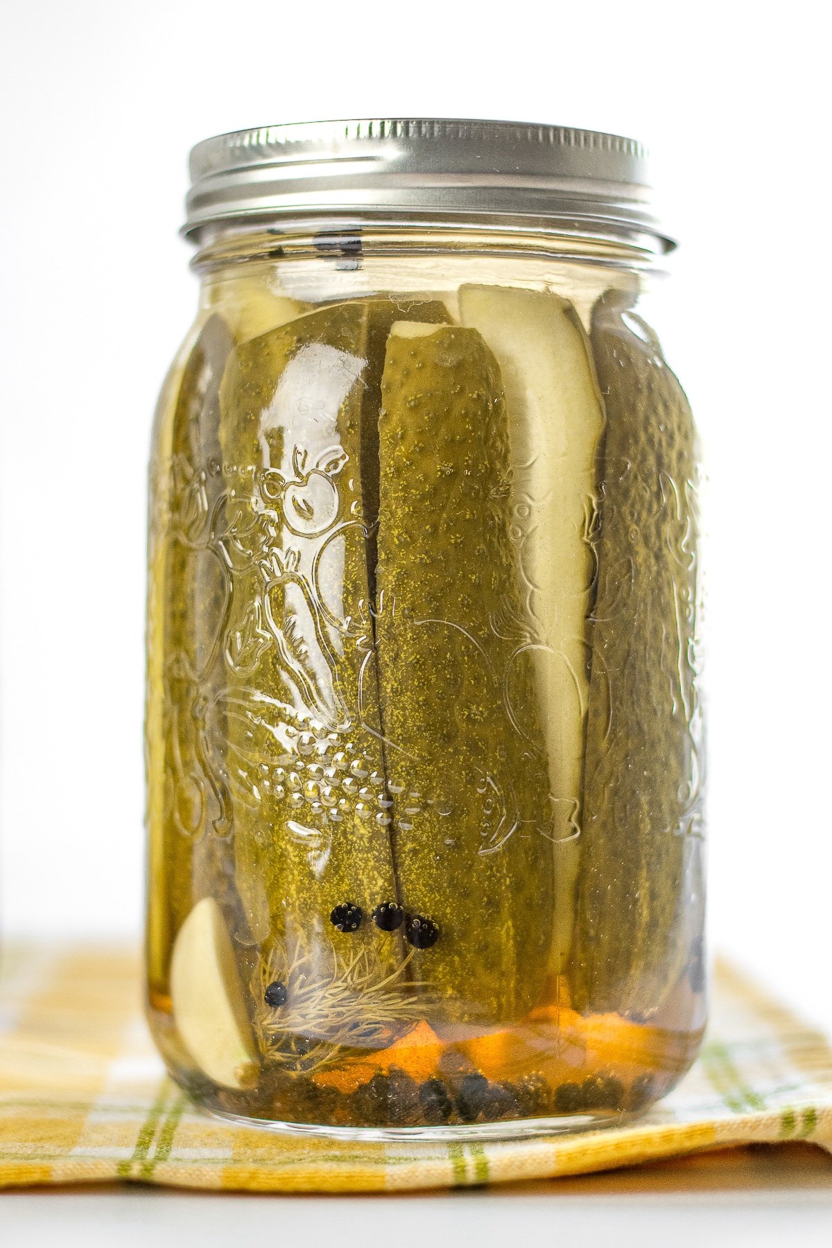 Homemade pickles in a jar.