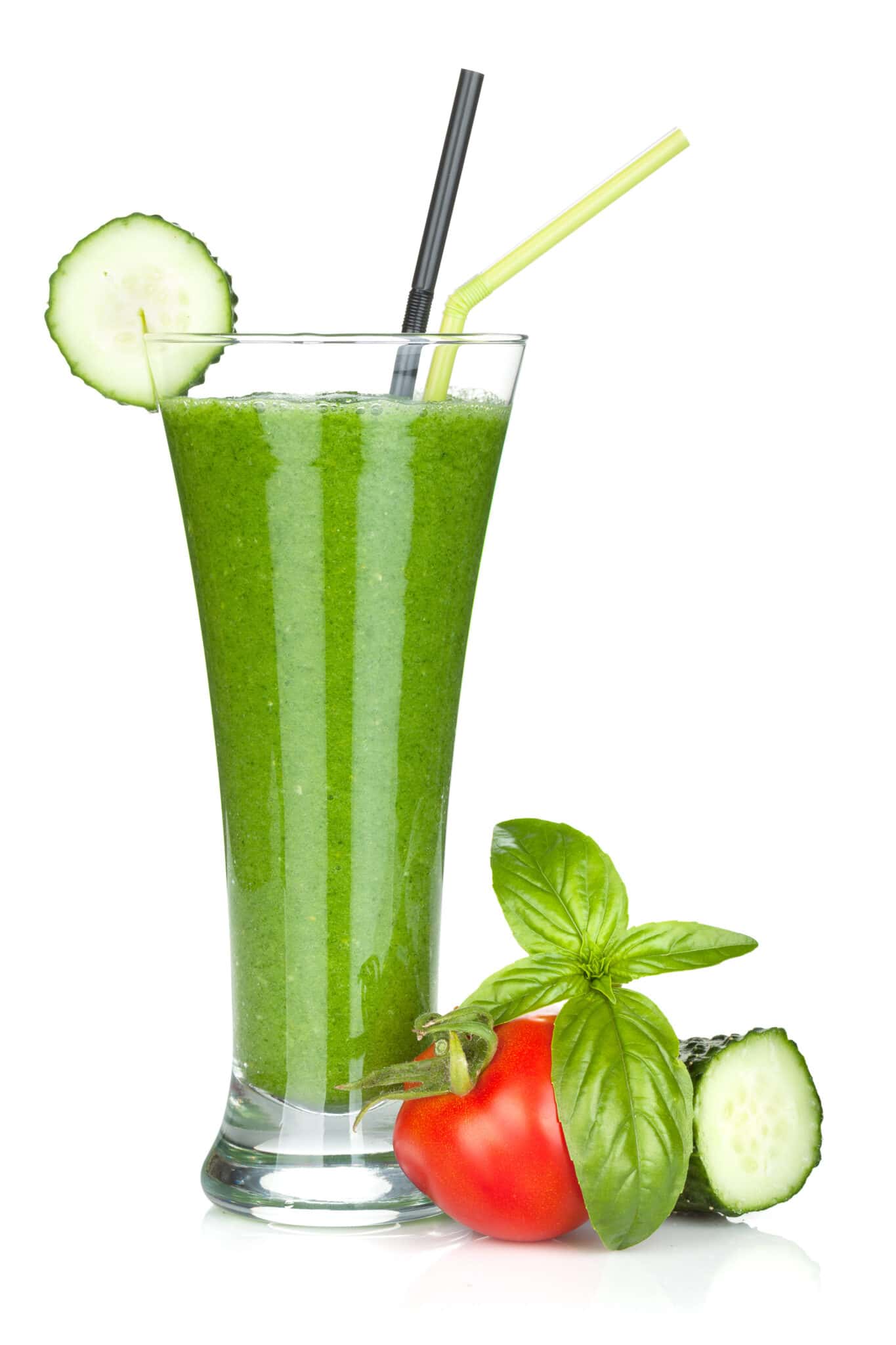 A tall cucumber smoothie with fresh vegetables.