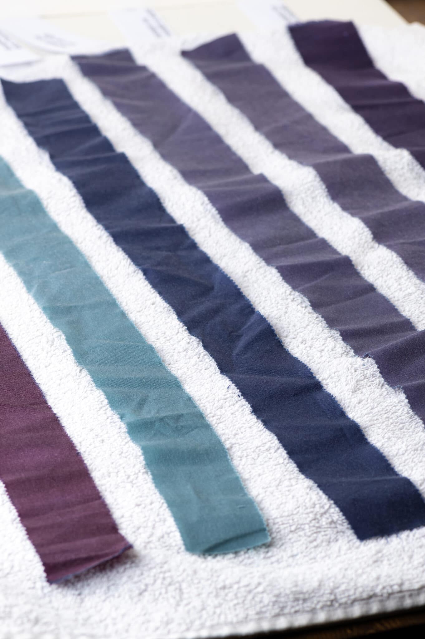 Strips of 100% cotton that have been coloured using a natural dye made from grapes. The colour is rich and vibrant, showing that natural fabrics take dyes very well.