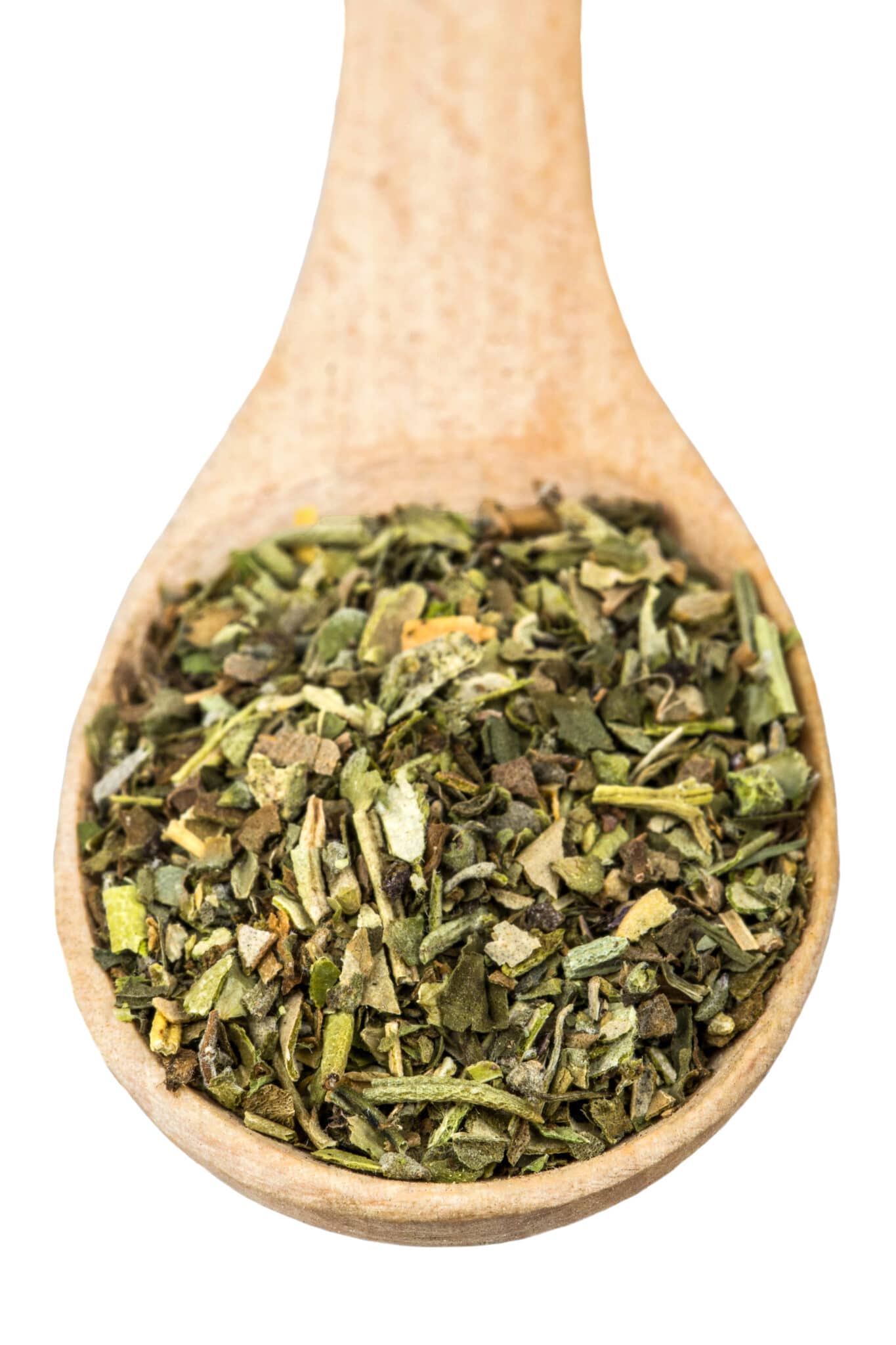 An upclose image of a wooden spoon filled with dried herbs.